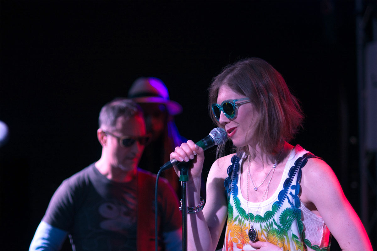 Woman sings at Court House Rocks.